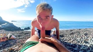 Youthful lads screwing on a public beach