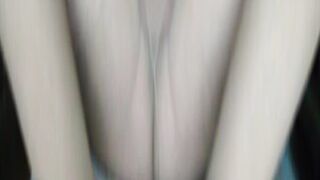 Nylonjunge in hose in front of TV