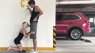 Unknown blond screws in a parking lot in plain sight