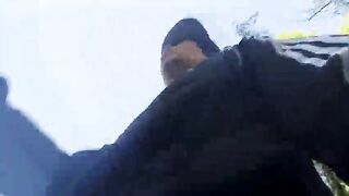 Who will spot this twink in a ebony-and-white Adidas tracksuit, flashing his dick in public—going commando—and peeing into the river?