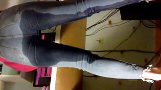 Emma pissing and working in constricted jeans