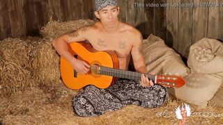 Homosexual oriental muscle guitarist plays with schlong on the hay