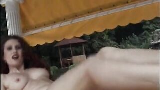 Charming brunette hair masturbates outdoors
