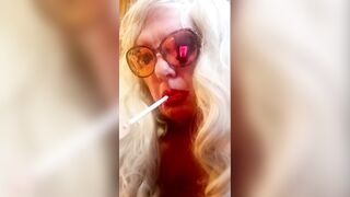 GRAND MOTHER LOVES TO SMOKE HER LENGTHY CIGARETTES AND RUB HER OILED LITTLE MELONS
