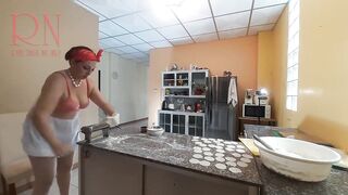 Nudist housekeeper Regina Noir cooking at the kitchen. Stripped maid makes dumplings. Undressed cooks. Brassiere 1