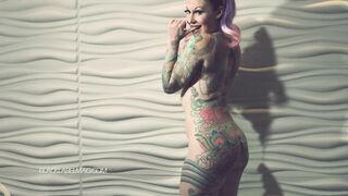 Tattooed Angel Disrobes Undressed