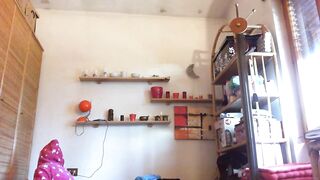 Nicoletta cleans an old attic wearing a giant bawdy diaper below her pants