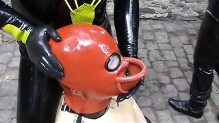 Latex Pair With Rubber In Transparent Catsuit Drinking Femdom Urinate