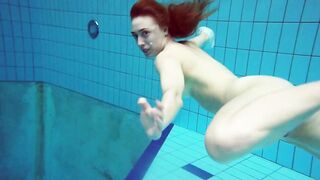 Diana's redhead cutie enhances her swimming grace