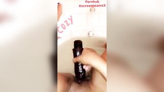 Black plays with sextoy in bathroom