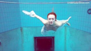 Diana Zelenkina enjoys swimming stripped