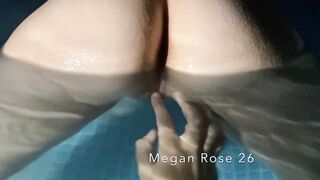 Lesbo pair playing in the pool on vacation