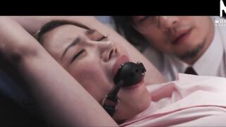 A secret rendezvous between a doctor and a nurse in a hospital at night