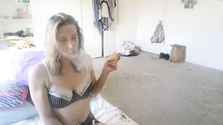smokin' a cigarette in my baby daddys abode when im not suppost to
