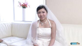 The recent Oriental bride remains attired in her bridal gown through a visitor's arrival