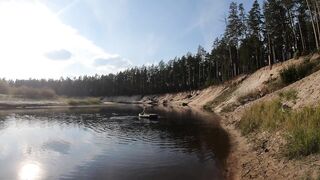 Undressed cutie in boat and walk in the swamp