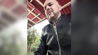 Wearing sexy leather, jerking of with two codoms on, and cuming a masive load