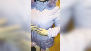 Aged woman wearing red thread in transparent leggings, captured on the street