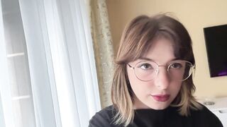 Gracious brunette hair in a t-shirt shows off her nice-looking melons