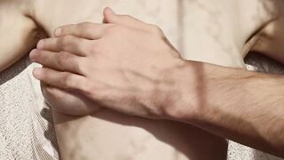 Massage of delicate titties in the sun