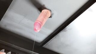 Massaging clients ramrod with a screw sleeve (milking table) Loud wanking sounds with a lot of cum.