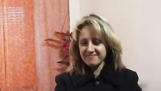 Breasty golden-haired showing her body