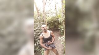Ebony cum face BBC sissy wench guy outdoors in the woods wearing pants and petticoat and cums.