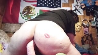 Large ass trans sits on vibrator