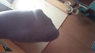 Little faggot shows off his feet