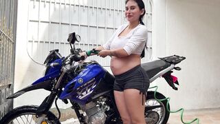 PREGGO WOMAN WASHING HER MOTORCYCLE AND HAVING VEHEMENT SEX